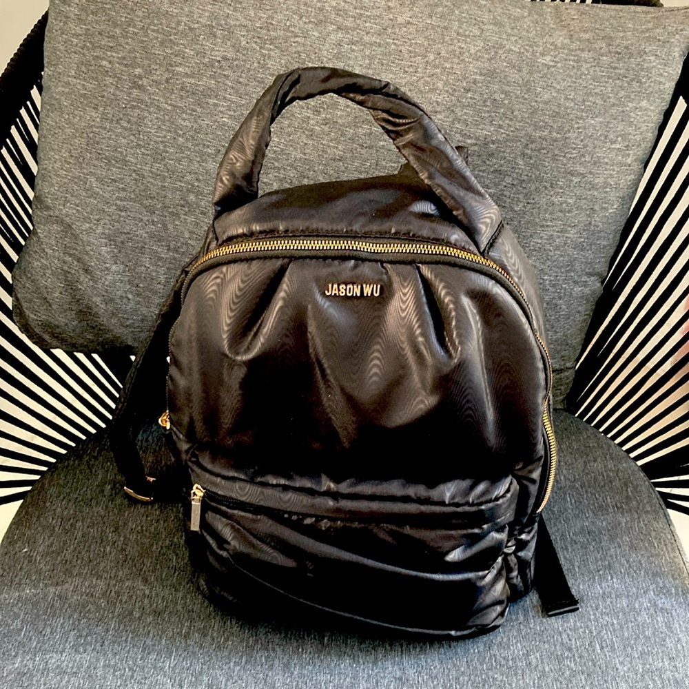 Jason Wu. Stylish back pack for on the go.Used once.